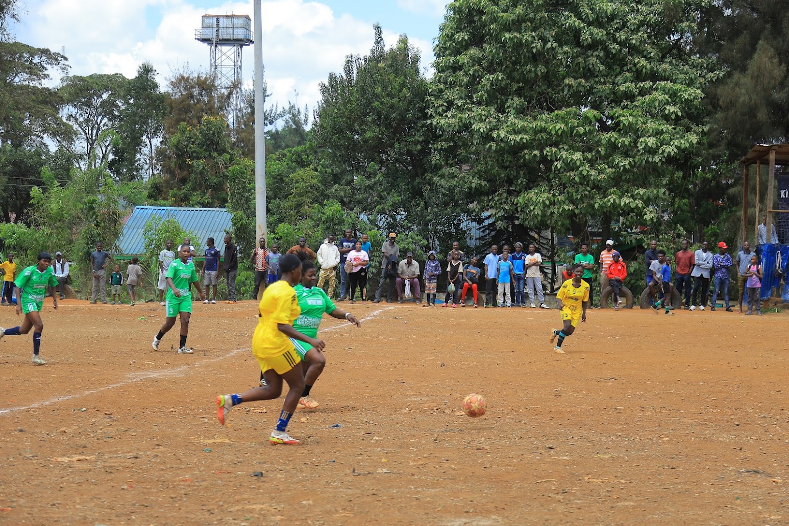 Teams preparing for kick-off at DC Grounds, Kibera