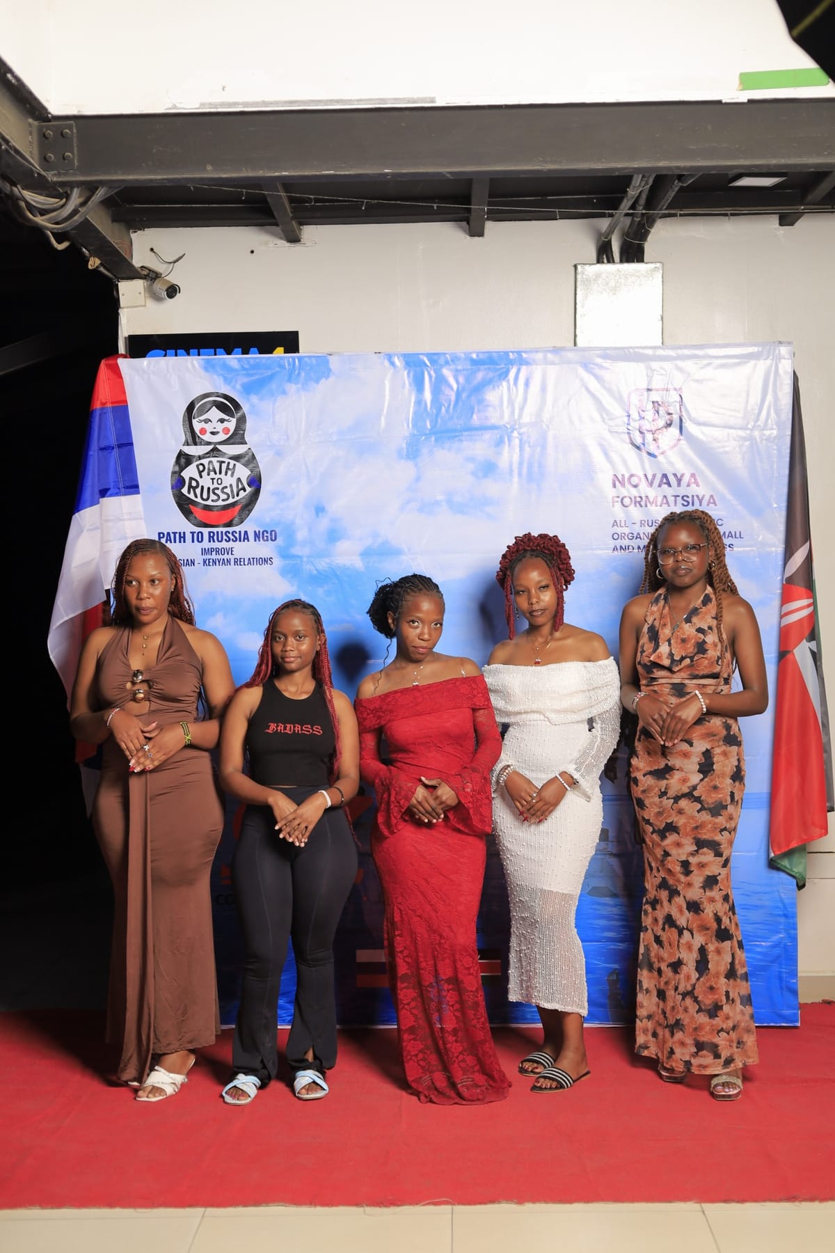 Premiere night attendees at the Path to Russia backdrop